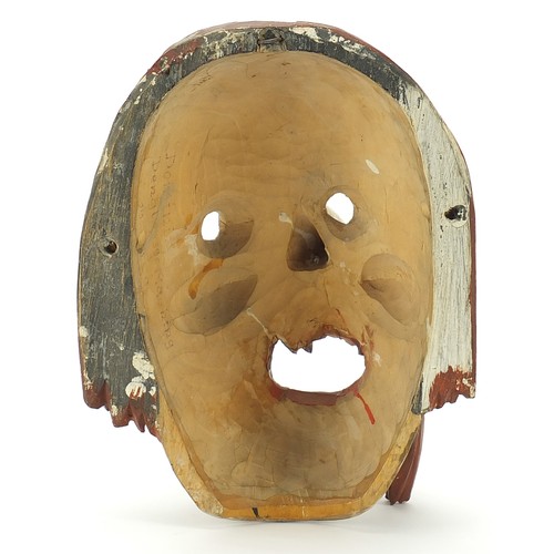 176 - Dominik Dengl, German painted carved wood face mask, 31cm high