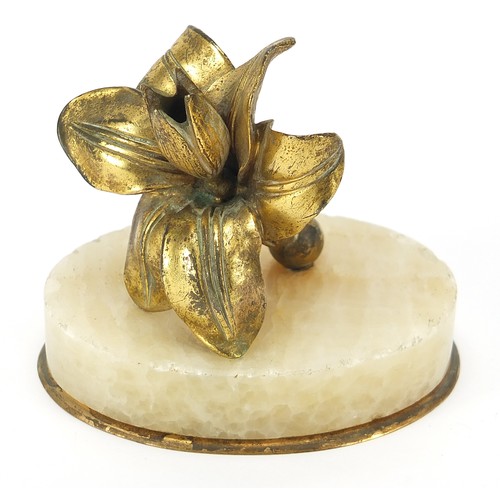 647 - Halcyon Days gilt metal and onyx pen holder in the form of the flower, 9.5cm wide