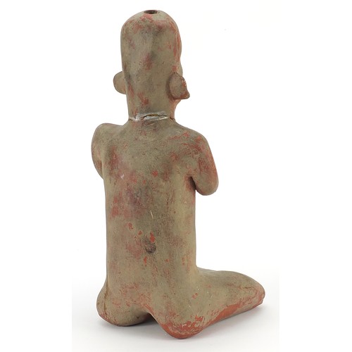 456 - South American pottery figure of a nude figure kneeling, 40.5cm high