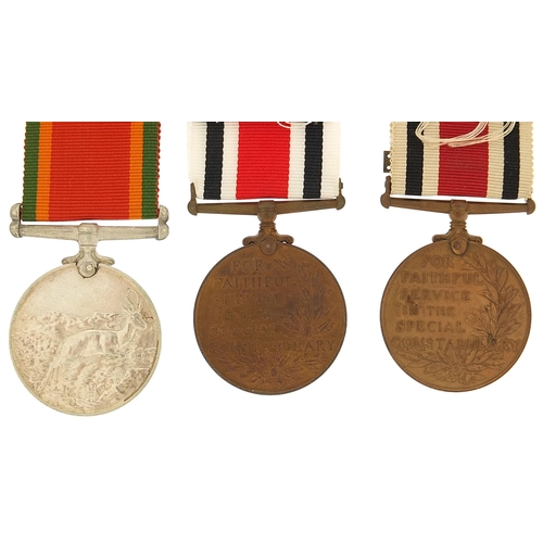 2063 - Two military interest Faithful Service medals and one other, awarded to George H Cooke, Frederick Ba... 