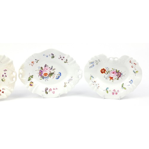 160 - Five early 19th century porcelain dishes hand painted with flowers, the largest 27cm wide