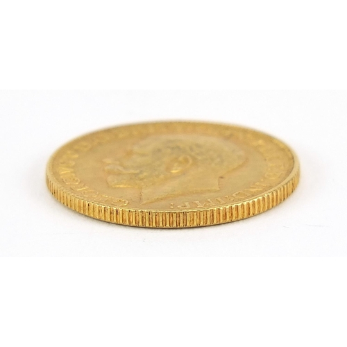 21 - George V 1928 gold sovereign, South Africa mint - this lot is sold without buyer’s premium, the hamm... 
