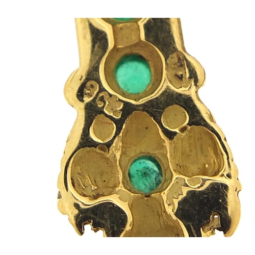 24 - 18ct gold cross pendant set with green stones, 3.6cm high, 6.4g - this lot is sold without buyer’s p... 