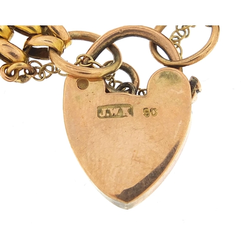 31 - 9ct gold four row gate link bracelet with love heart padlock, 16cm in length, 17.6g - this lot is so... 