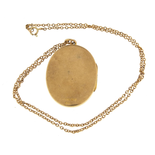 35 - 9ct gold oval locket on a 9ct necklace, 3.3cm high and 42cm in length, 8.4g - this lot is sold witho... 