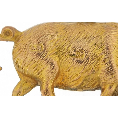 37 - Two 9ct gold pig and boar charms, the largest 3cm in length, total 2.2g - this lot is sold without b... 