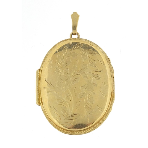 47 - Large 9ct gold oval locket engraved with flowers, 4.2cm high, 12.2g - this lot is sold without buyer... 