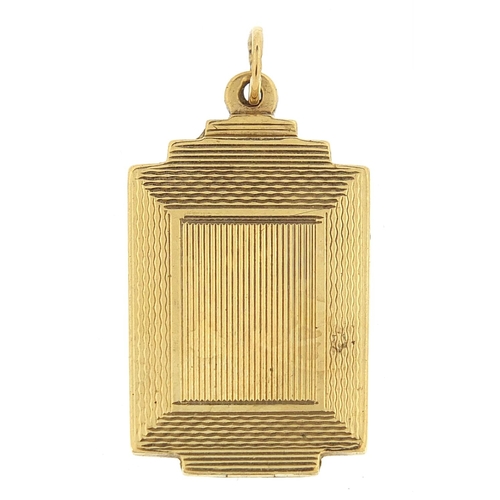58 - 9ct gold engine turned pendant, 3.0cm high, 7.4g - this lot is sold without buyer’s premium, the ham... 