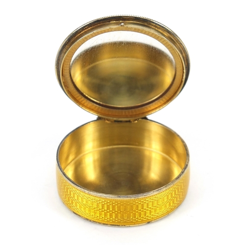 21 - Continental 935 silver and yellow guilloche enamel pill box with hinged lid and mirrored interior, i... 