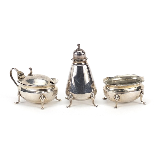 62 - Chinese silver three piece cruet marked Sterling, Made in Hong Kong, the largest 7.5cm high, weighab... 