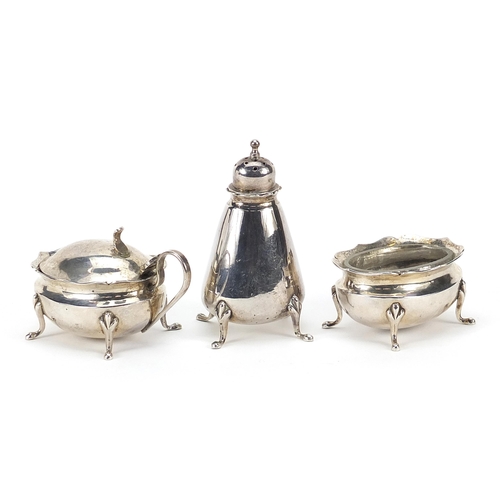 62 - Chinese silver three piece cruet marked Sterling, Made in Hong Kong, the largest 7.5cm high, weighab... 