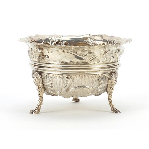 68 - George Nathan & Ridley Hayes, Victorian silver bowl embossed with hogs and swans, raised on three li... 