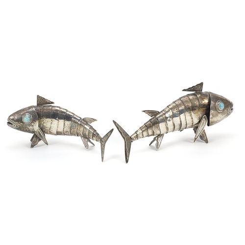 25 - Graziella Laffi, two Peruvian articulated silver fish with turquoise eyes, 19cm and 17cm in length, ... 