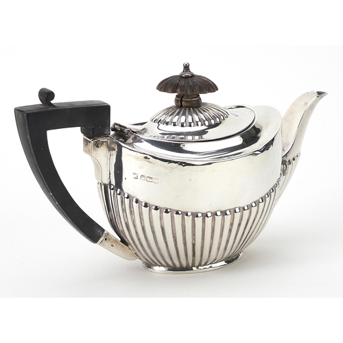 James Deakin & Sons, George V silver demi fluted teapot with