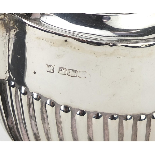 James Deakin & Sons, George V silver demi fluted teapot with