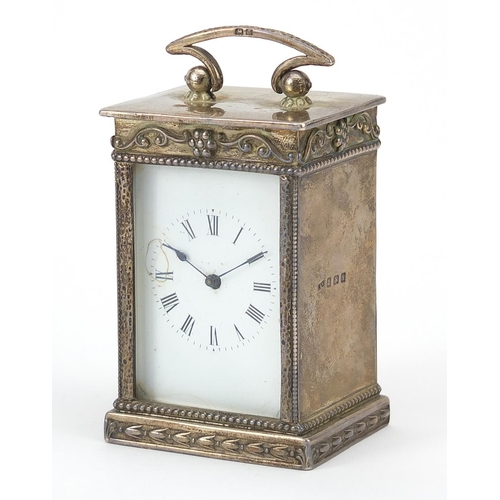 26 - Tongue & Walker, George V silver cased carriage clock with enamelled dial and swing handle, Birmingh... 