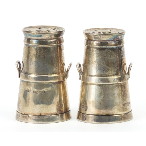 22 - John Tongue, pair of Edwardian silver casters in the form of milk churns, Birmingham 1903, 4.8cm hig... 
