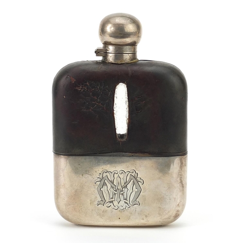 67 - James Dixon & Sons Ltd, Edwardian silver and leather mounted glass hip flask with detachable cup and... 