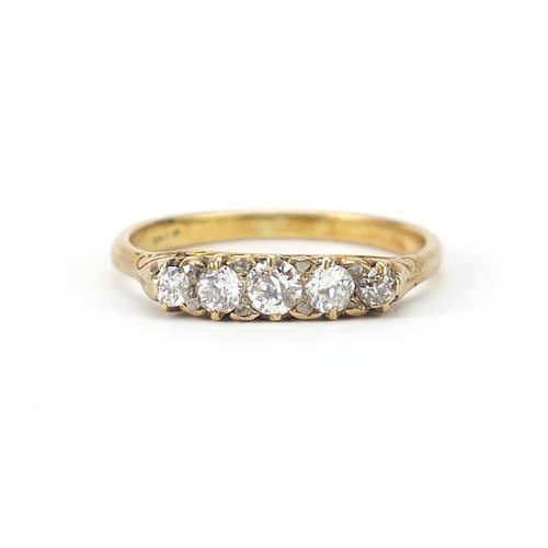 157 - 18ct gold graduated diamond five stone ring, the central diamond approximately 0.15ct, size R/S, 3.0... 