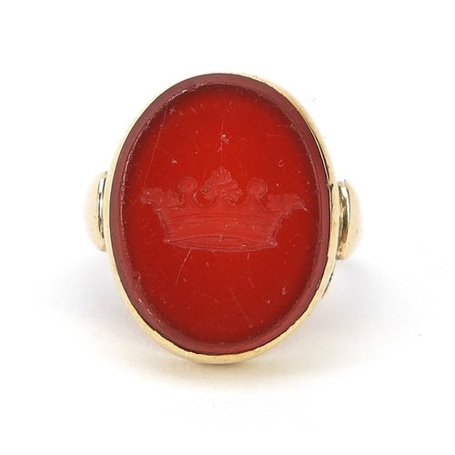 167 - Antique gold carnelian intaglio seal ring carved with a crown, indistinct marks, size G, 5.1g