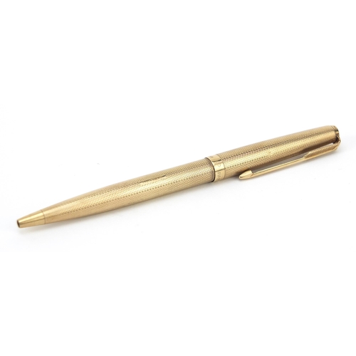 8 - Parker, 9ct gold cased Biro pen with engine turned body, 12.8cm in length, 18.5g