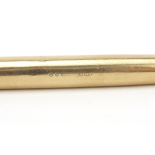 9 - Sampson Mordan & Co, Edwardian 9ct gold cased propelling pencil, London 1930, 12.6cm in length, 31.2... 