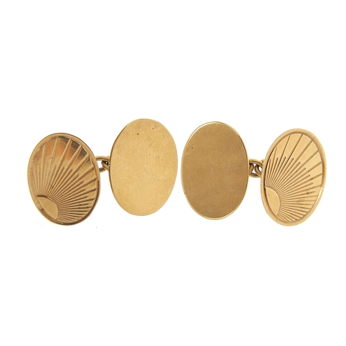 146 - Pair of 9ct gold engine turned cufflinks, 1.5cm wide, 3.7g