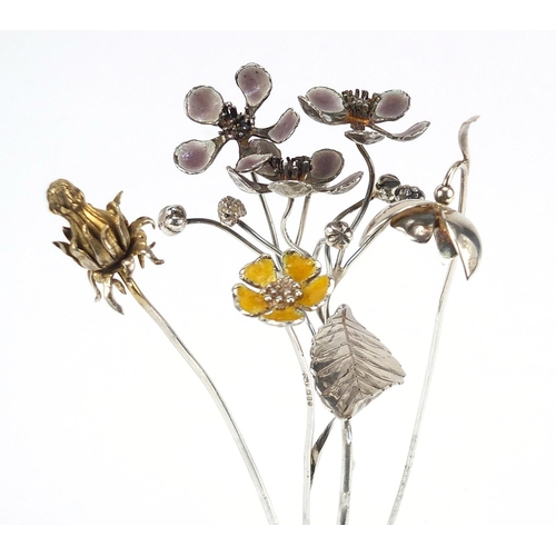 42 - Sarah Jones, four contemporary 1980's silver flowers, two with enamel including a thistle, various L... 