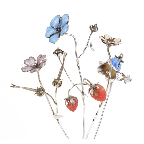 17 - Sarah Jones, four contemporary 1980's silver and enamel flowers, including a bluebell and strawberri... 