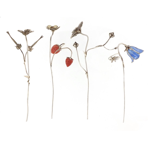17 - Sarah Jones, four contemporary 1980's silver and enamel flowers, including a bluebell and strawberri... 