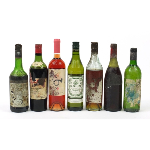 851 - Seven bottle of vintage and later alcohol to include 1959 Lamouroux Margaux