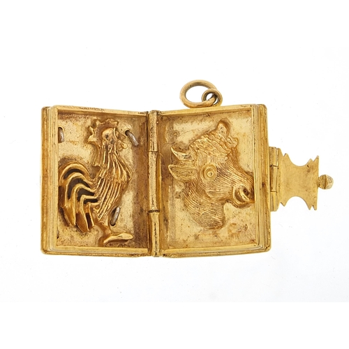 143 - Heavy 9ct gold Cock and Bull storybook charm, opening to reveal a cock and bull, 2.2cm high, 12.9g