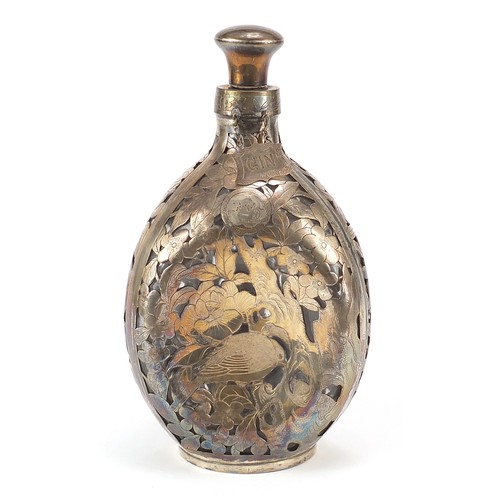 36 - Chinese silver overlaid glass decanter with gin label, pierced and engraved all over with birds amon... 