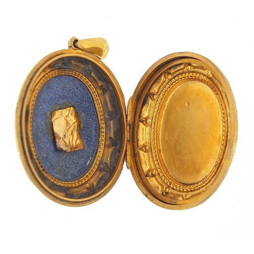 173 - Victorian gold coloured metal enamel and seed pearl locket, 4cm high, 12.2g