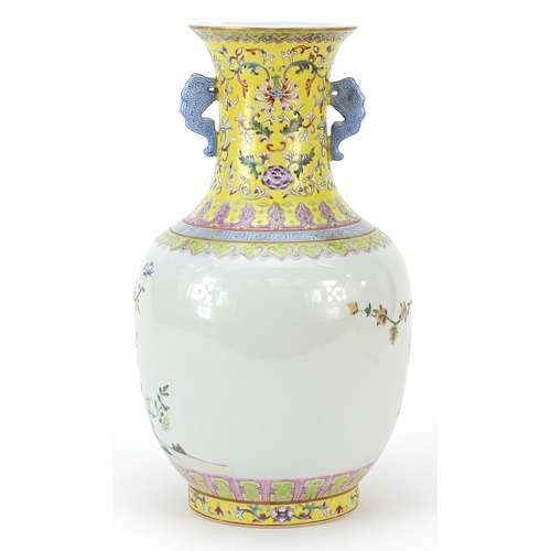 1278 - Chinese porcelain vase hand painted in the famille rose palette with flowers and scrolling foliage, ... 