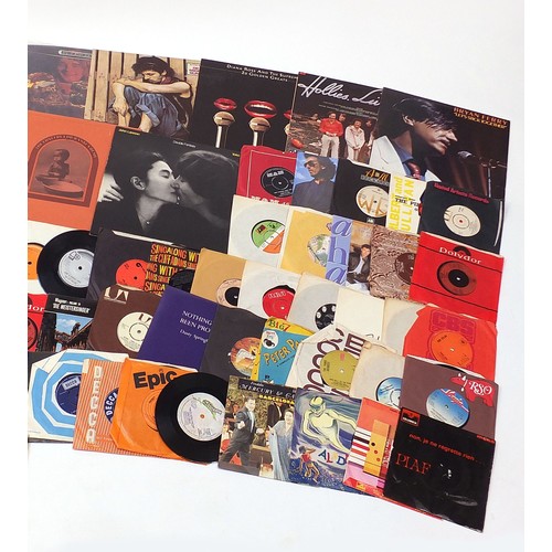 718A - Vinyl LP's and 45 rpm records including George Harrison, The Concert for Bangladesh box set, Leo Say... 