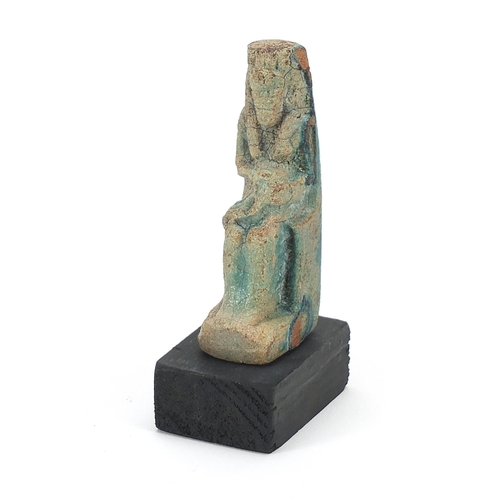 1527 - Egyptian style stone figure raised on a wooden base, overall 10cm high