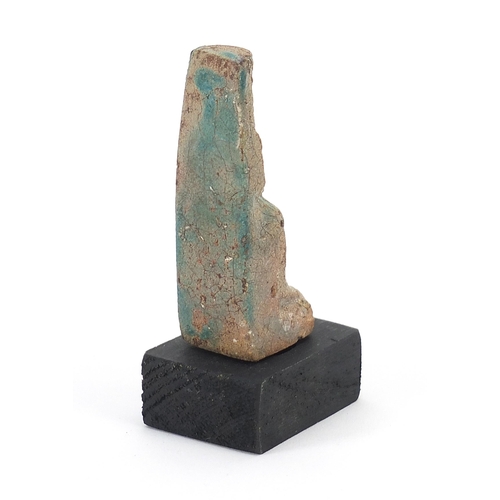 1527 - Egyptian style stone figure raised on a wooden base, overall 10cm high