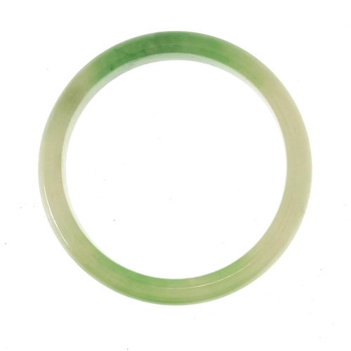 1327 - Chinese green jade bangle, 7cm in diameter