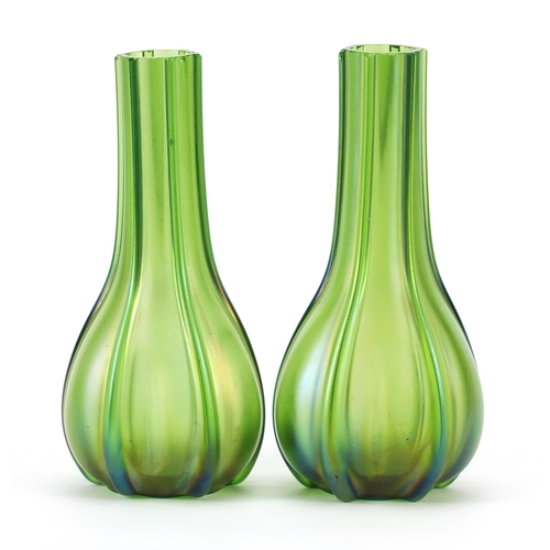 1220 - Pair of Art Nouveau iridescent green glass vases in the style of Loetz, each 18cm high