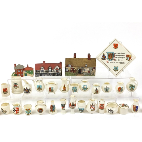 1369 - Crested ware to include W H Goss Anne Hathaway's Cottage night light and Willow Cottage, the largest... 