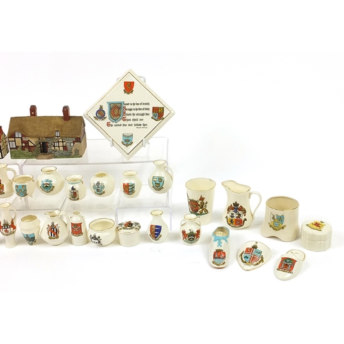 1369 - Crested ware to include W H Goss Anne Hathaway's Cottage night light and Willow Cottage, the largest... 