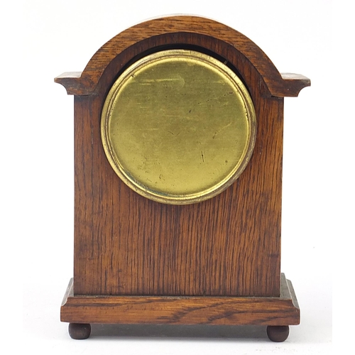 1214 - French oak cased mantle clock with enamel dial and barley twist columns, 20cm high