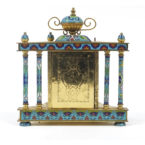 111 - Champleve enamel and brass mantle clock with urn finial and circular dial having Roman and Arabic nu... 