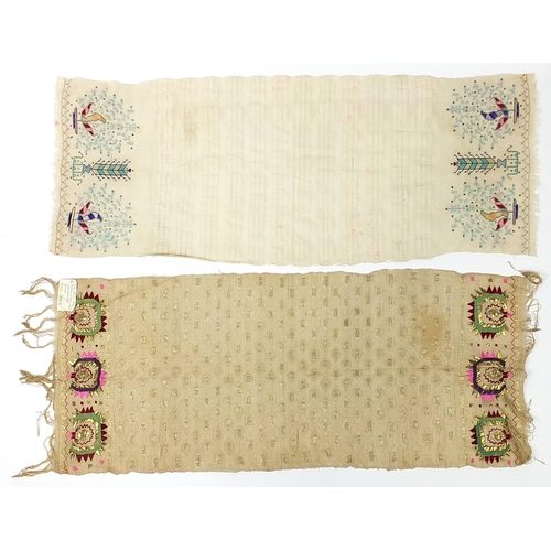 454 - Three antique South Serbian ceremonial towels embroidered with flowers, the largest each 110cm x 40c... 