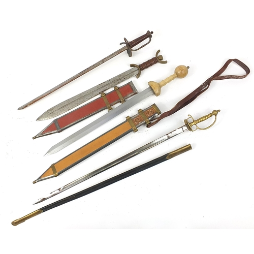 632 - Four military and Medieval style swords, one with unassociated scabbard, the largest 106cm in length