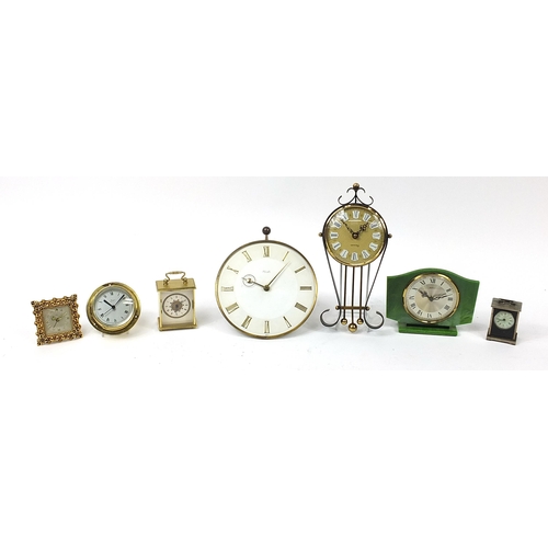 1729 - Clocks including a Bentima green marbleised mantle clock, brass ship's bulkhead design clock and a K... 