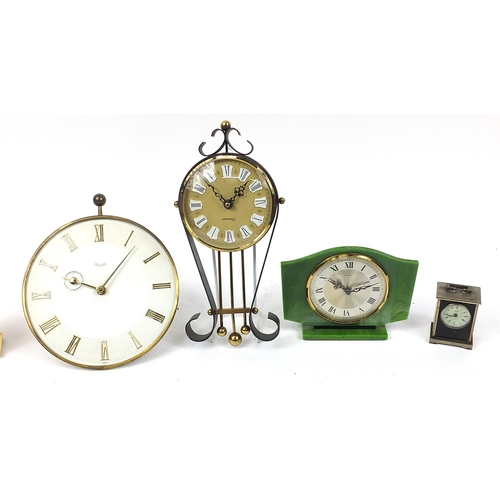 1729 - Clocks including a Bentima green marbleised mantle clock, brass ship's bulkhead design clock and a K... 