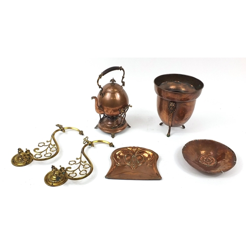 1704 - Decorative arts metalware including a copper teapot on stand with burner, copper dish embossed with ... 