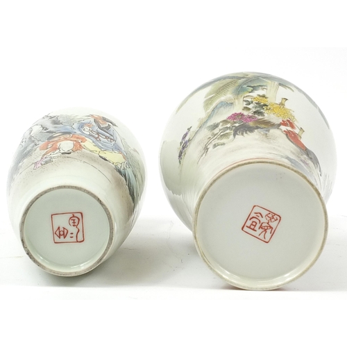 531 - Two Chinese porcelain vases, hand painted in the famille rose palette with figures and cockerels, ir... 